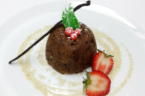 Warm English Christmas pudding with Brandy Crème Anglaise